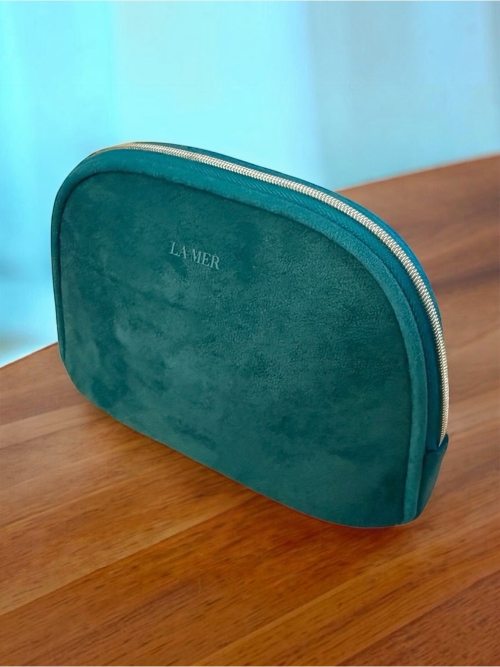La Mer Teal Velvet Cosmetic / Makeup Bag
- NWOT